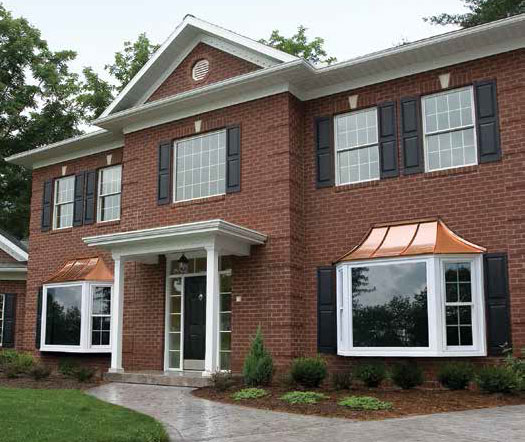 Home exterior with bay windows